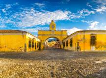 low camera position for shot of the Arch of Santa Catalina in Antigua, Guatemala - one of the icons of this town.